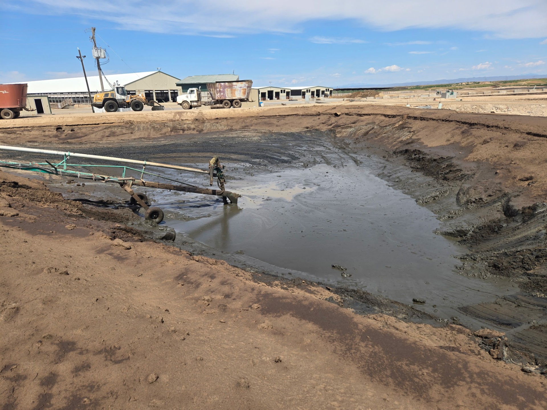 Lagoon pump removing solids from a dairy lagoon